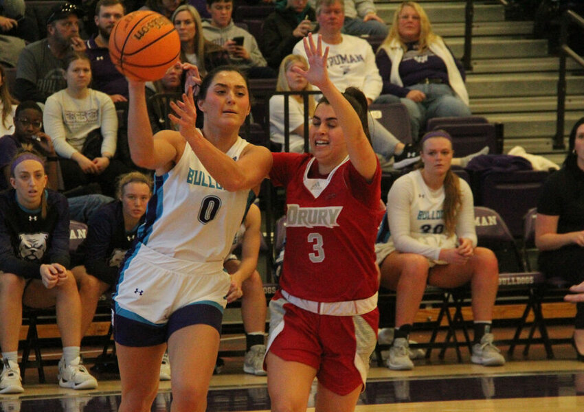 Truman guard Gracie Neff passes the ball along the baseline in the game against Drury on Jan. 20.&nbsp;