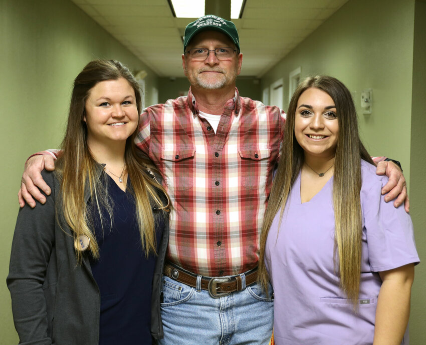 Robert &ldquo;Shane&rdquo; Truesdell with Brooke Sprague, FNP-C (left) and Kiley Waddle.