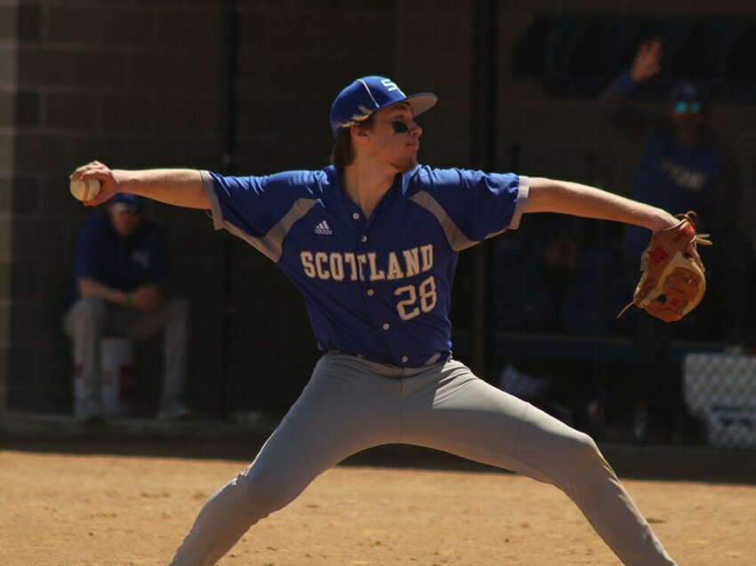 Scotland County junior Marcus Smith winds up for a pitch in the game against Putnam County on April 13.&nbsp;
