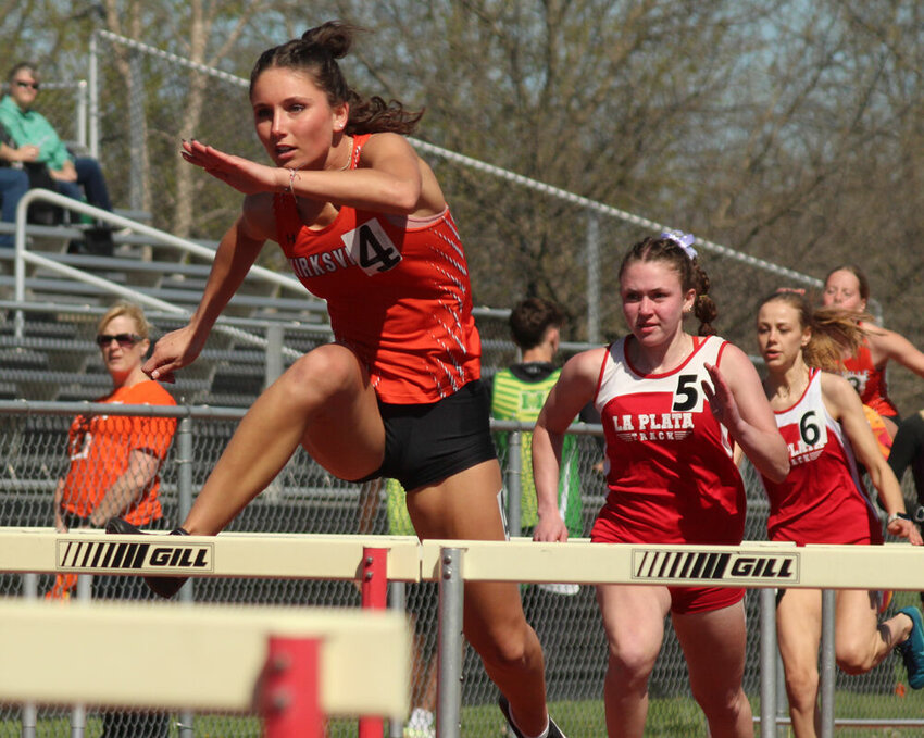 Kirksville senior Jersey Herbst runs with a lead in the 100 meter hurdles at the Tiger Invitational on April 12. 