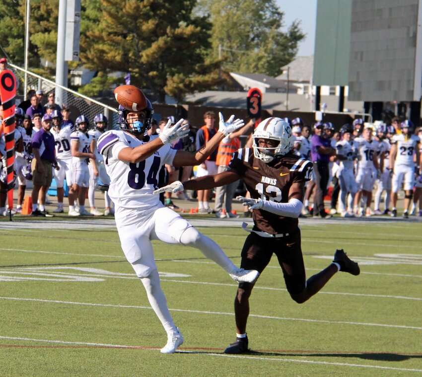 Although the photo might not quite do it justice, redshirt freshman Kel Battle makes one of the most phenomenal concentration catches for what proved to be the game-deciding touchdown in recent Bulldog memory. The Quincy defensive back got a hand on the football while both players were in the air and it appeared to ricochet off of Battle's shoulder pad or forearm.