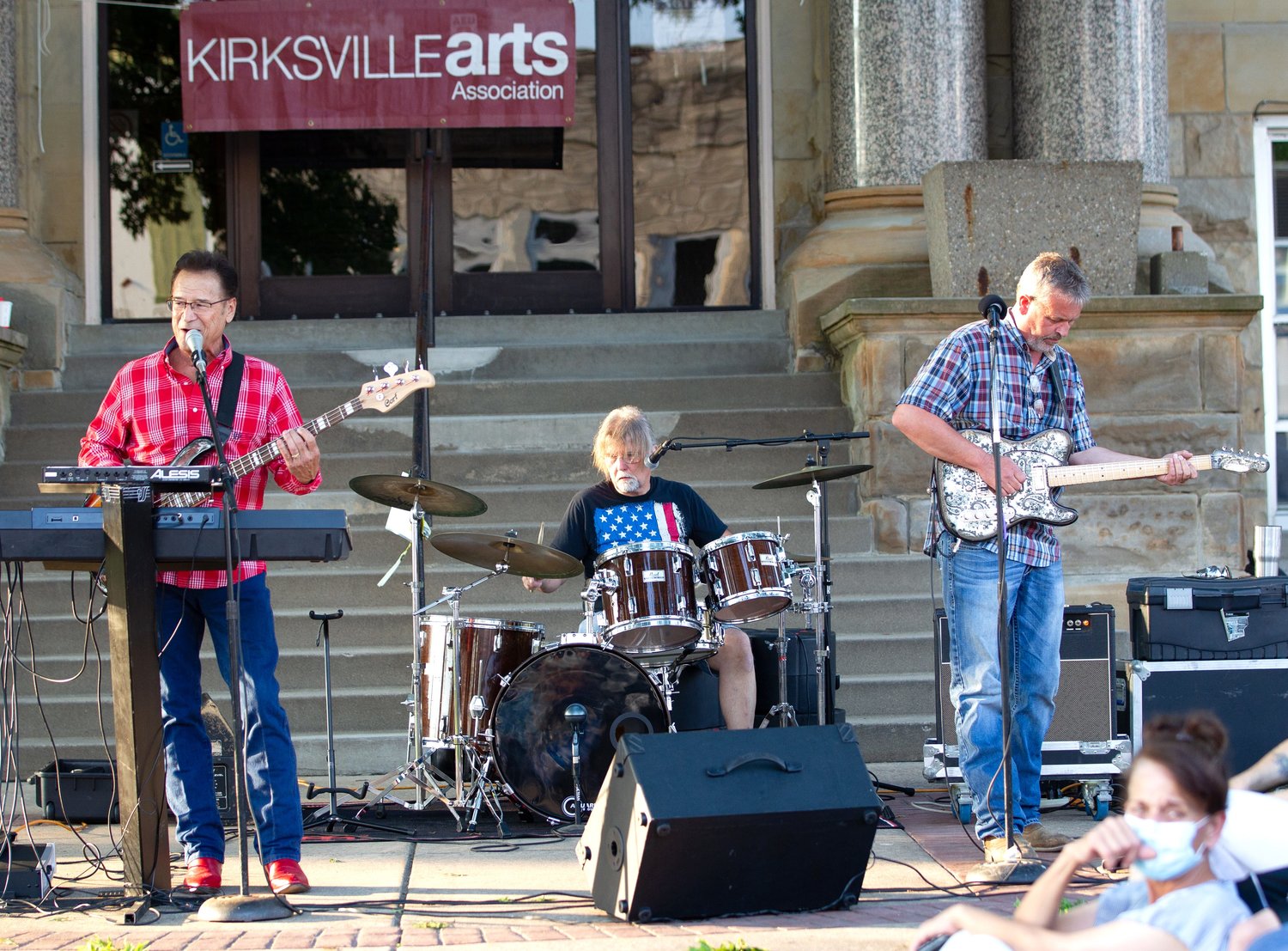 The Aaron Russell Band performs as part of the Summer on the Square Concert Series in front of the Adair County Courthouse.
