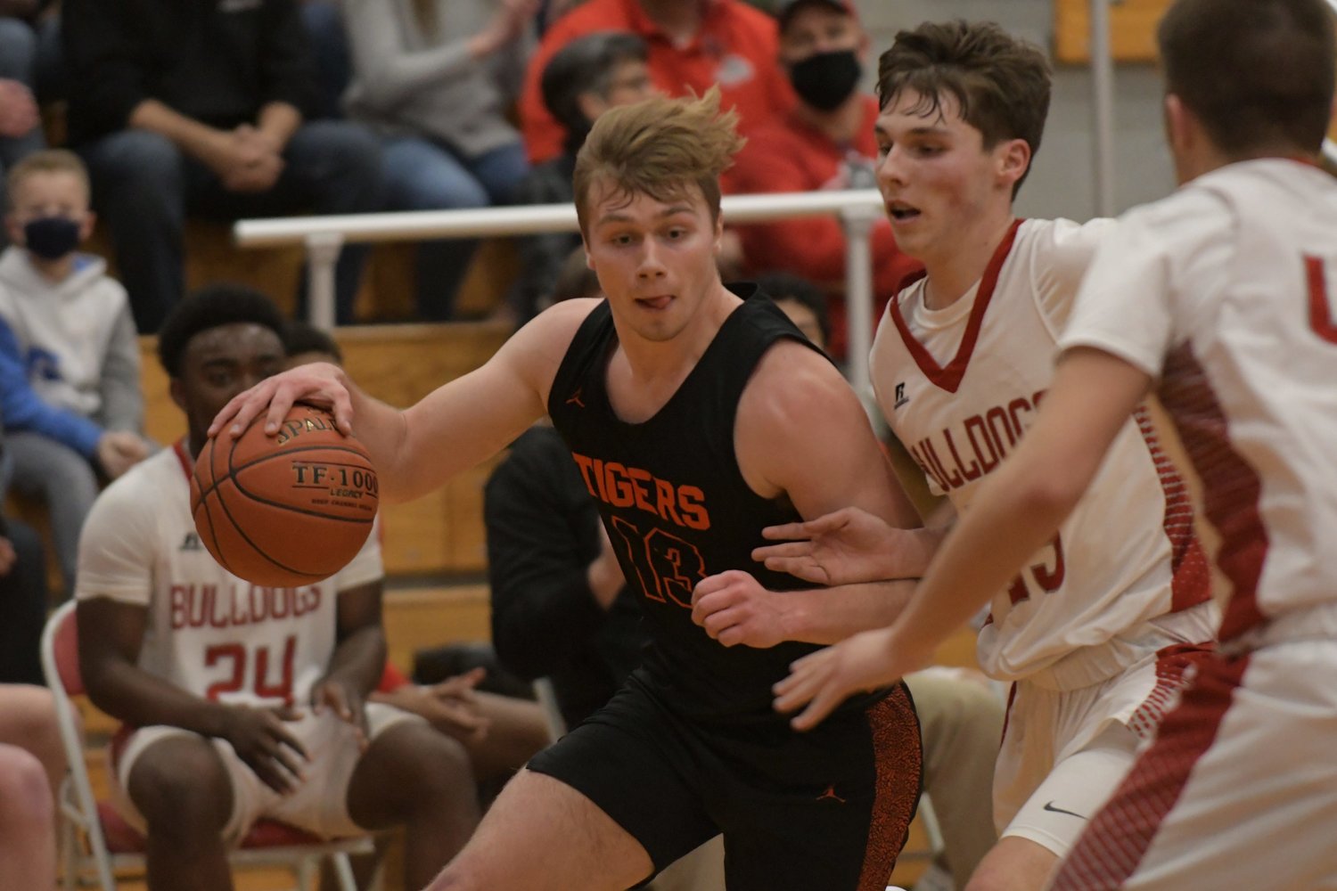 Kirksville senior forward Noah Copeland drives past a Mexico defender during the Class 5 District 15 title game in Mexico.