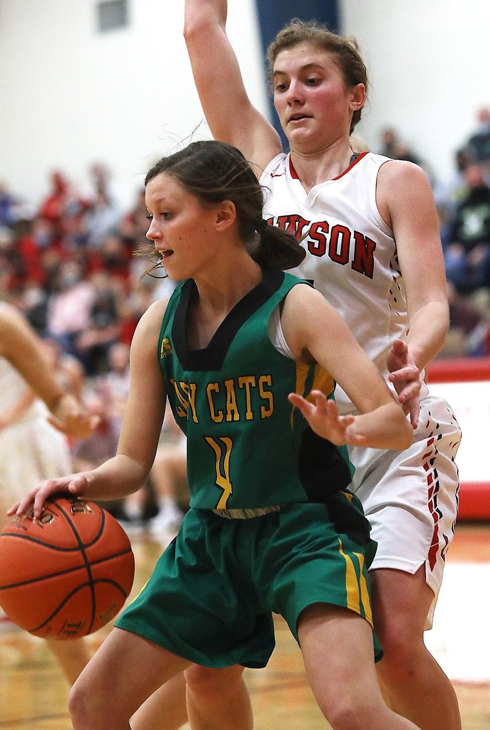 Milan’s Hallie Weaver competes Wednesday evening during Sectional Basketball at Lawson High School.