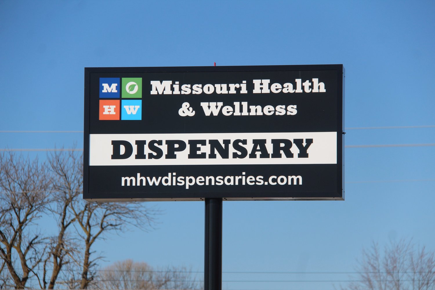 The sign outside of Kirksville's Missouri Health &amp; Wellness dispensary, located at 215 East Charles Street.