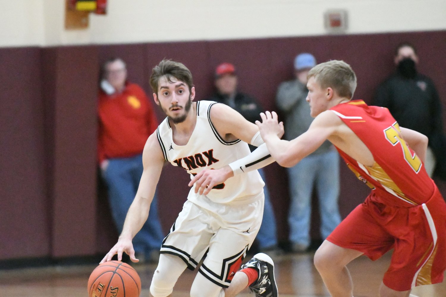 Knox County senior guard Coltin Morrow dribbles past a North Shelby defender during Monday's 62-52 win at the Tri-Rivers Classic.