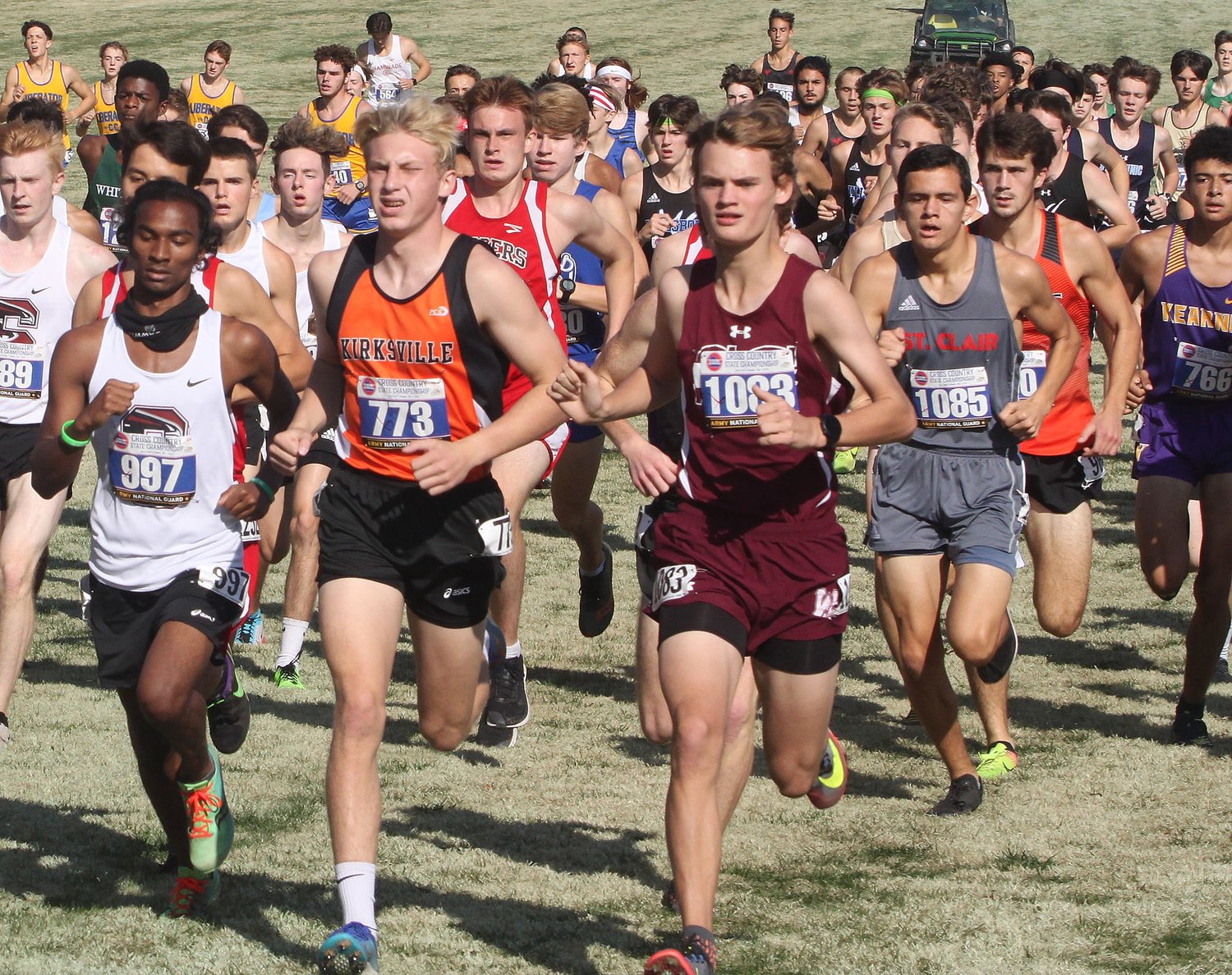Kirksville's Dominic Cahalan, middle left, runs during the Class 4 state cross country meet Friday.