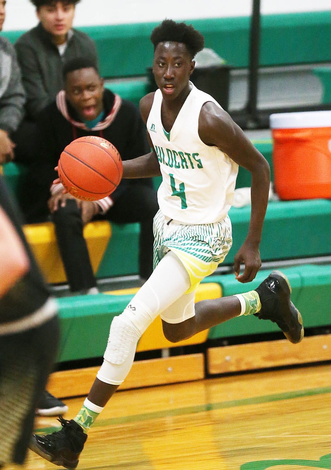 Milan's Chekh Niasse competes Thursday evening during the 61st Milan Invitational Tournament.