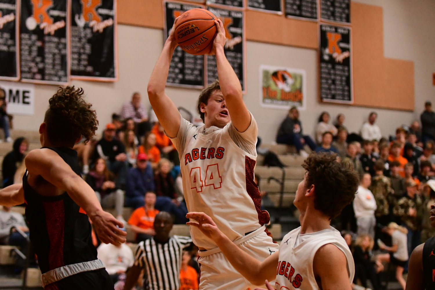 Kirksville's Camden Dempsay grabs one of many rebounds in a win over Macon on Jan. 11, 2022.