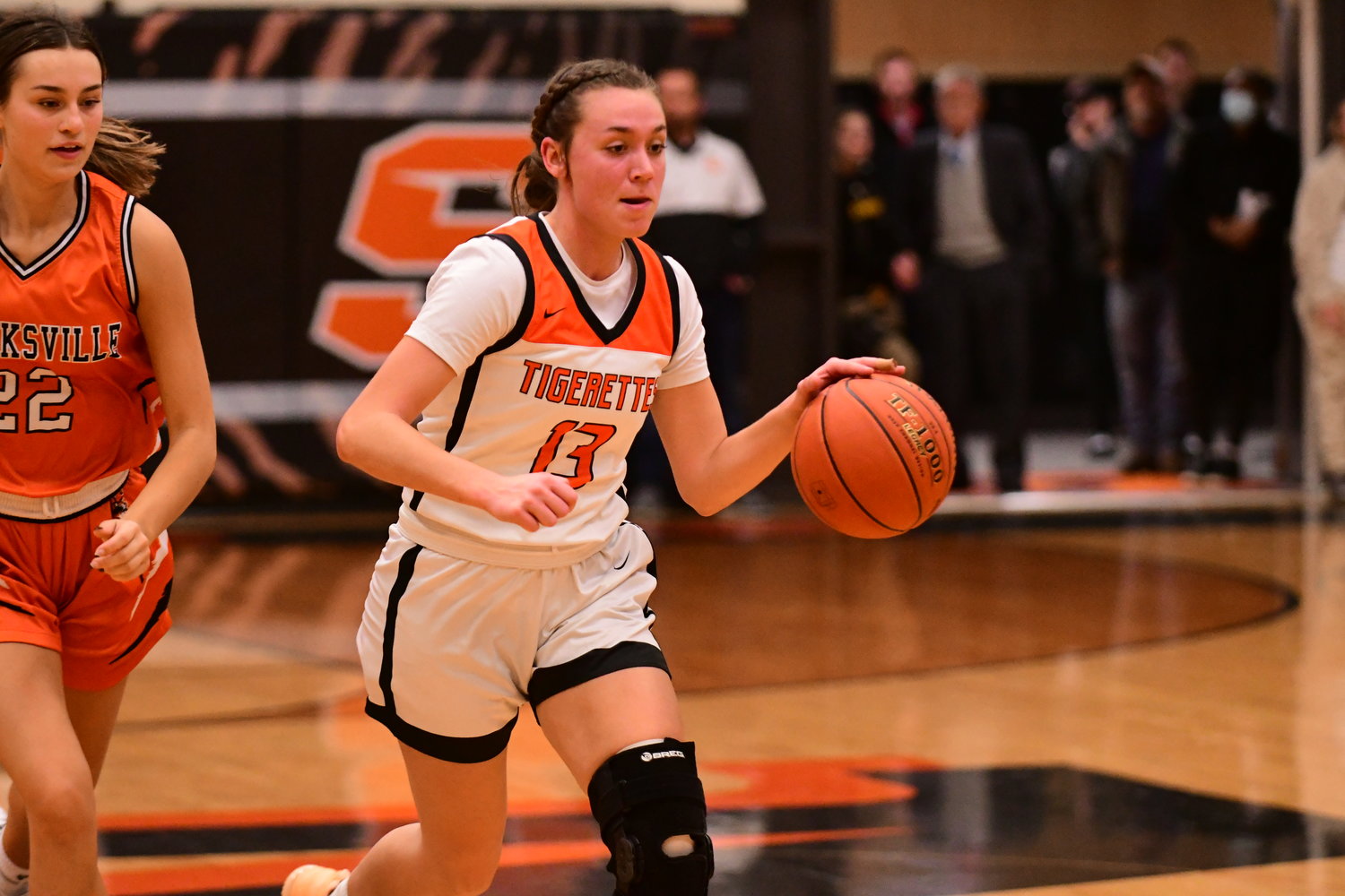 Macon's Lexi Miller dribbles during the Macon Invitational title game against Kirksville.