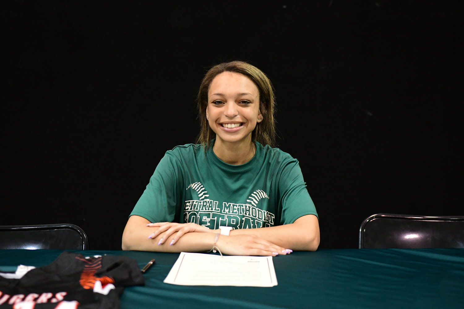 Brashear's Kynleigh White smiles after signing her NLI Wednesday with the Central Methodist softball team.