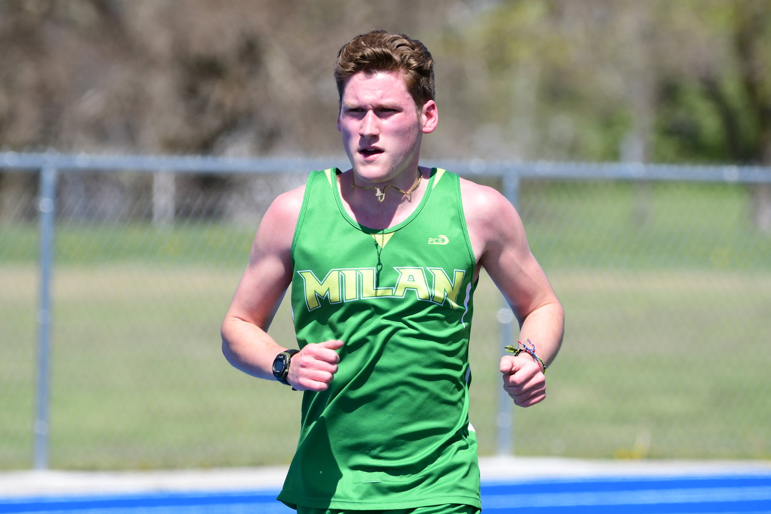 Milan's Nathan Keck runs in the 3200m at Saturday's Class 2 District 3 meet.