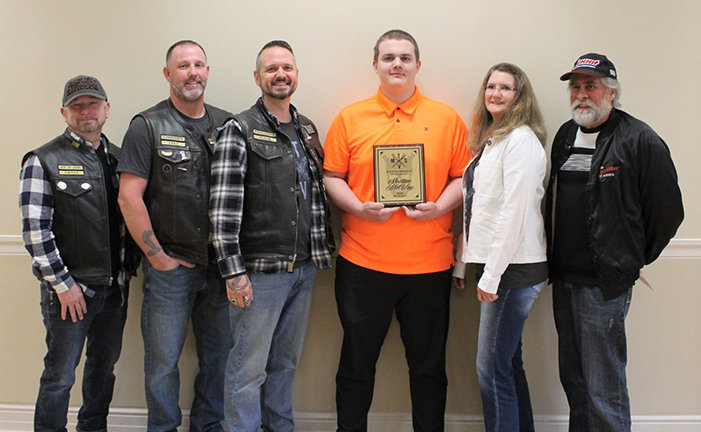 660 Tim Voss Memorial Scholarship: Left to right, members of the 660 Charitable Motorcycle Organization: Bill Puryear, Jack Thompson, Nicholas Panos, KHS Student Shelton McVay, Christine and Dirk Vos (Tim Voss’ parents).