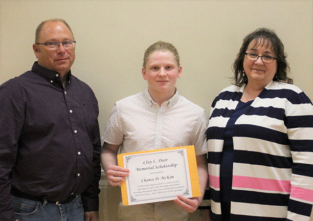 Clay Darr Memorial Scholarship: Bruce and Robin Darr presenting to Chance McKim.