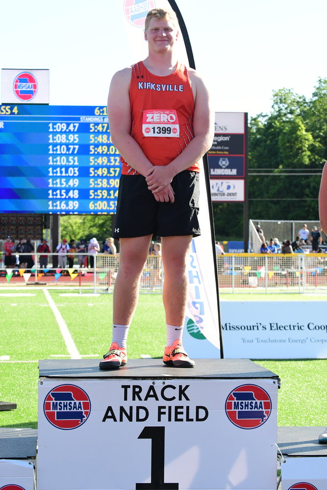 Kirksville's Owen Fraser stands on top of the podium after winning the Class 4 discus event at the 2022 MSHSAA State Track Championships.