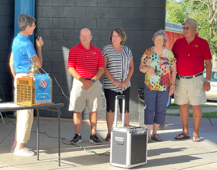 Janet Gremaud swears in incoming officers for Rotary Club of Kirksville-Thousand Hills, Terry Combs, Linette Page, Pat Kurtzeman and Ernie Loft.
