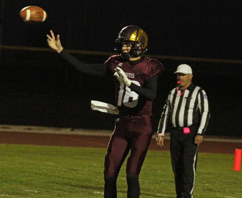 Schuyler County quarterback Conner Smith releases a pass against King City. 