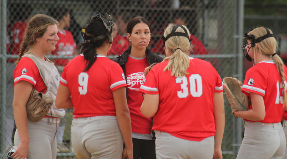 La Plata softball coach Sarah Farnsworth talks with her team during a coach's visit in the game against Green City on Sept. 22. 