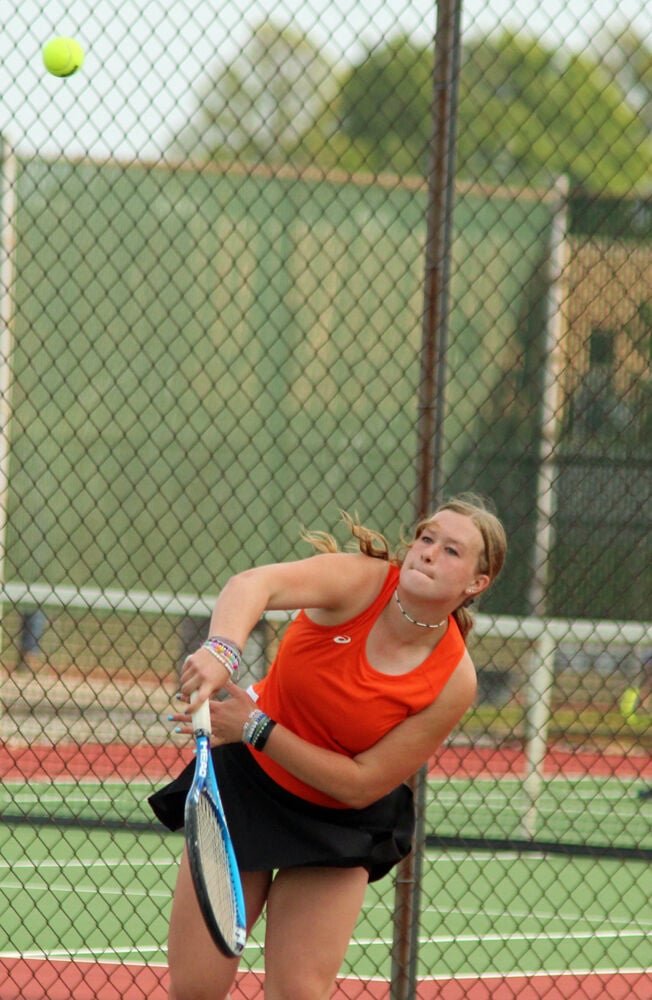 Kirksville junior Lauren Xander follows through on a serve in singles play against Trenton on Sept. 15. 