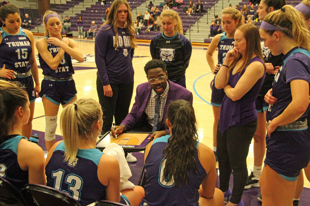 Truman women's basketball coach Theo Dean addresses the team during a timeout against Indianapolis on Nov. 28. 