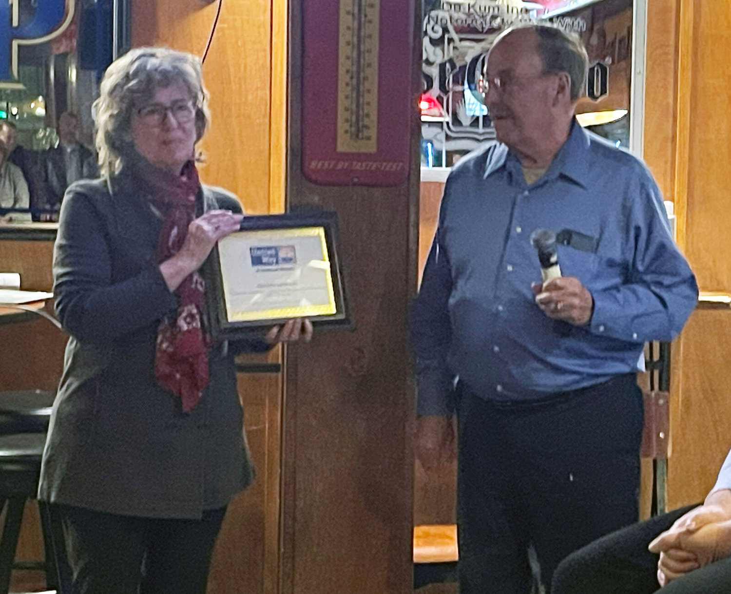 Annette Sweet, Regional Accounts Executive for Ameren Missouri accepts the Generosity Award (highest per capita giving by employees). Pictured with Sweet is United Way Executive Director Bill Castles. 