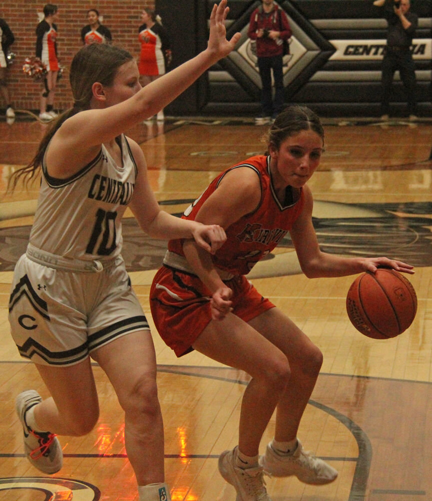 Kirksville junior Jersey Herbst backs down a Centralia defender in the game on March 2. 