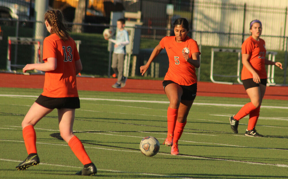 Kirksville senior Frida Ramirez moves the ball up the field against Southern Boone on April 6.
