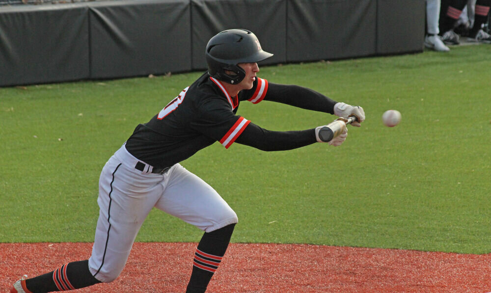 Kirksville senior Drew Chrisman squares around to bunt in the game against Mexico on April 20. 
