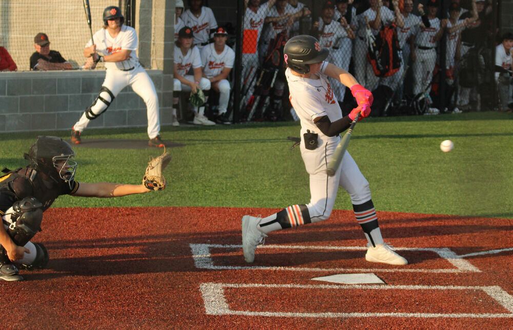 Macon senior Logan Hillard takes a swing in the game against Fulton on May 23. 