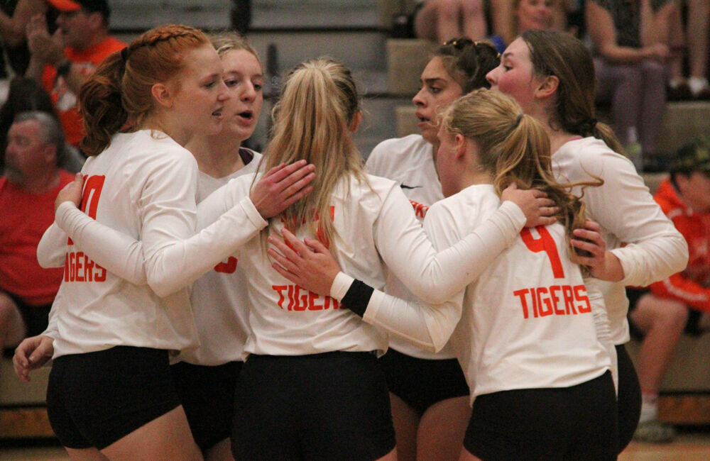 The Kirksville volleyball team briefly huddles up after scoring a point against Hannibal on Sept. 21. 