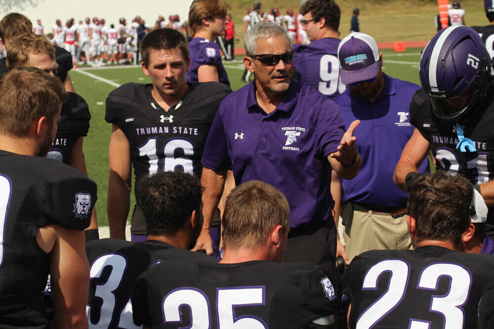 Truman State head coach Gregg Nesbitt addresses the defense on the sideline during the game against Saginaw Valley State on Sept. 16.