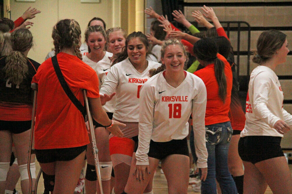 The Kirksville volleyball team runs onto the court prior to the match against Marshall on Sept. 28. 