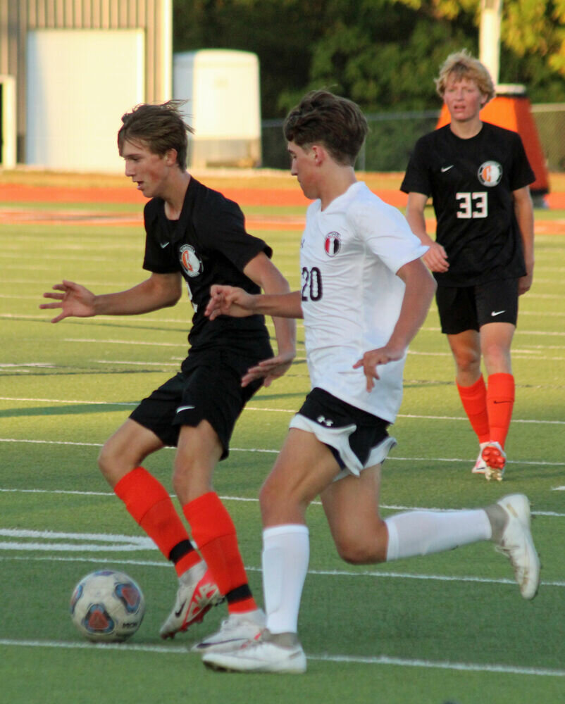 Kirksville freshman Beckett Lyons looks to keep the ball from a Chillicothe defender in the match on Sept. 26. 