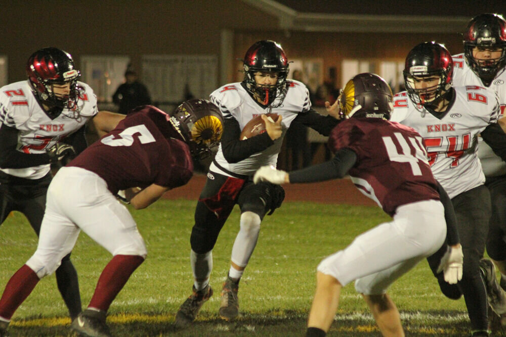 Knox County senior Collin Hayes runs up the middle in the game against Schuyler County on Nov. 3. 