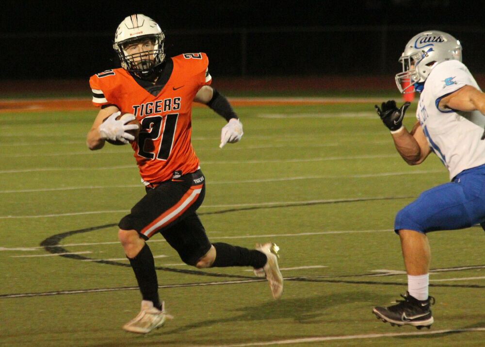 Kirksville running back Jace Kent runs toward the sideline in the game against Capital City on Oct. 20. 