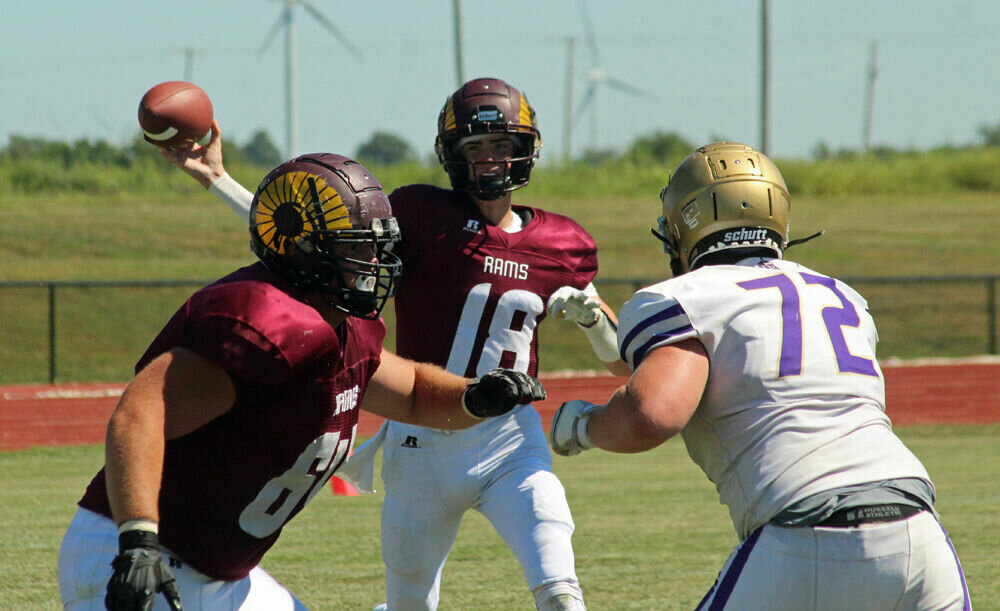 Schuyler County senior Connor Smith releases a sidearm pass in the game against Bishop LeBlond on Sept. 2. 