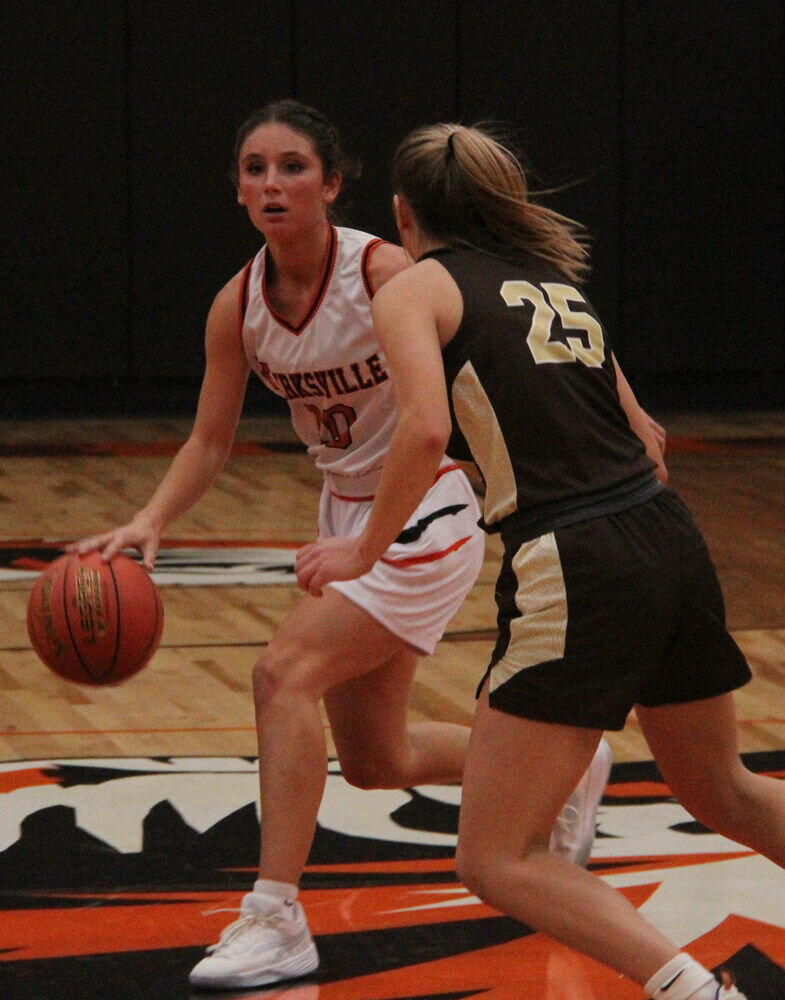 Kirksville senior Jersey Herbst brings up the ball in the game against Highland on Nov. 21. 