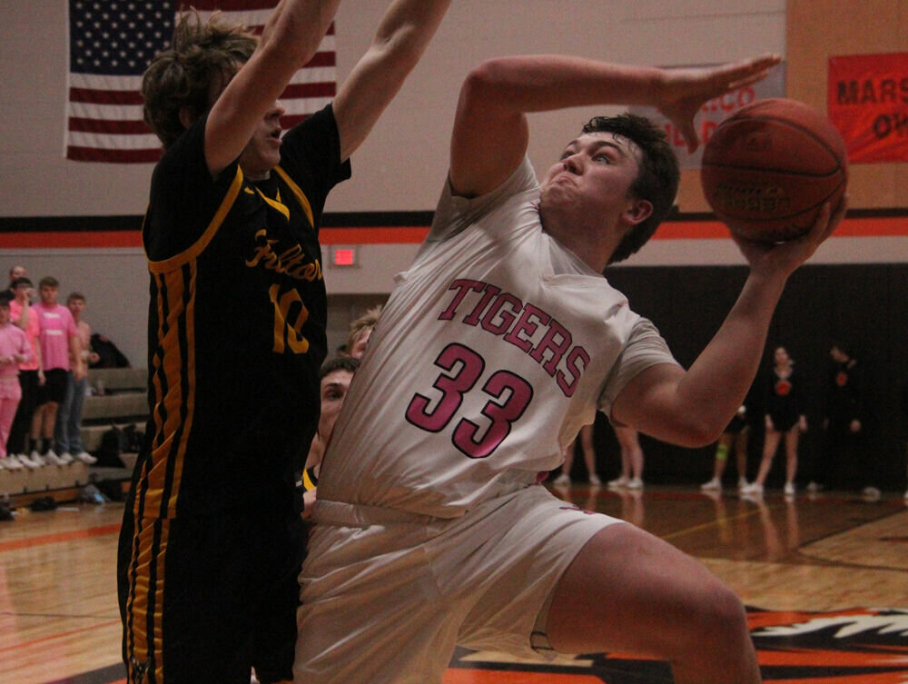 Kirksville senior Justin McKim puts up a tough shot to score two of his 34 points in the game against Fulton on Feb. 9. 