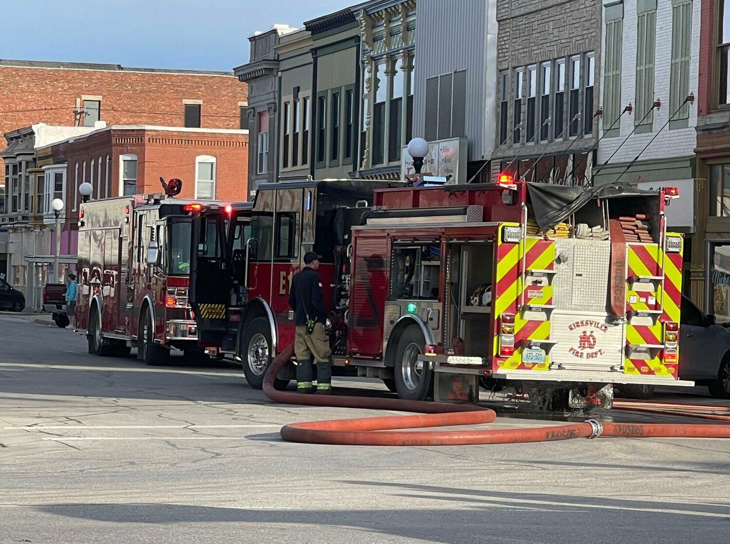 Firefighters on-scene at a fire on West Washington Street across from the courthouse. 