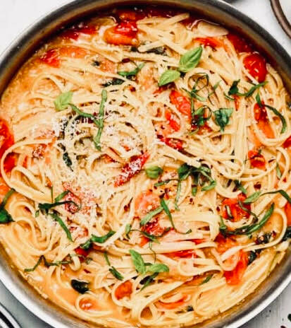 One Pan Pasta literally takes minutes to compile and cook. With a side of garlic bread and a green salad, dinner is served in less than 30 minutes.