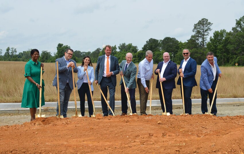 From left, Manning Mayor Julia Nelson, Sen. Jeff Zell, Rep. Fawn Pedalino, Homanit President Fritz Homann, Clarendon County Development Board Executive Director George Kosinski, and Clarendon County Council Chairman Jay Johnson, join other officials for the ceremonial groundbreaking of Homanit’s new $250 million facility in Alcolu on June 4. The project is expected to bring 300 jobs to Clarendon County.