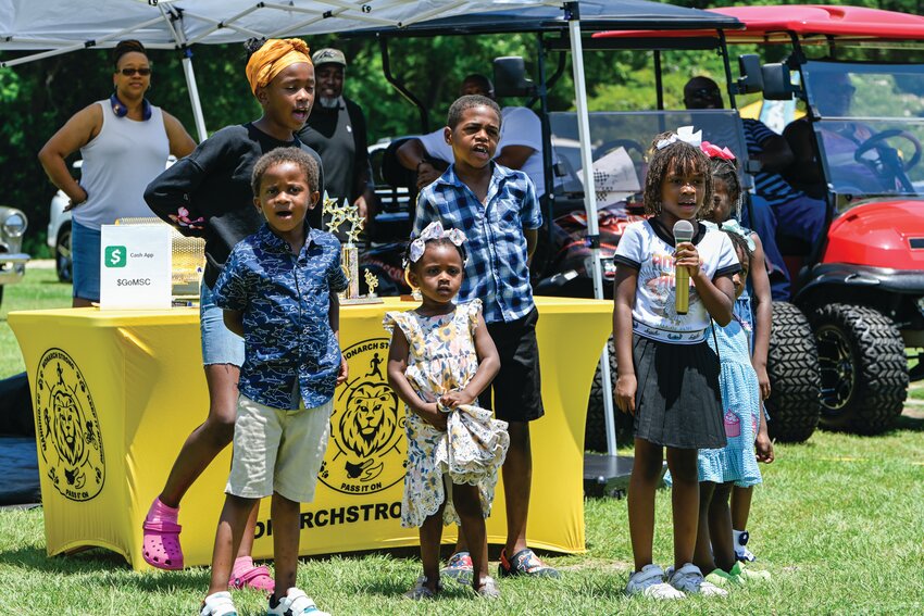 Young performers sing during the &ldquo;Monarchs Got Talent&rdquo; competition at the Monarch Strong event. Ten acts competed for trophies and prizes, with awards chosen by audience vote.