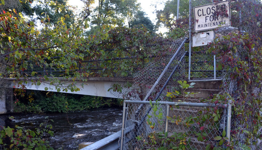 The pedestrian bridge that connects Waupaca's Hidden Park to the nearby Rotary Riverview Park has been closed for safety concernsfor more than a decade..Jim Card Photo