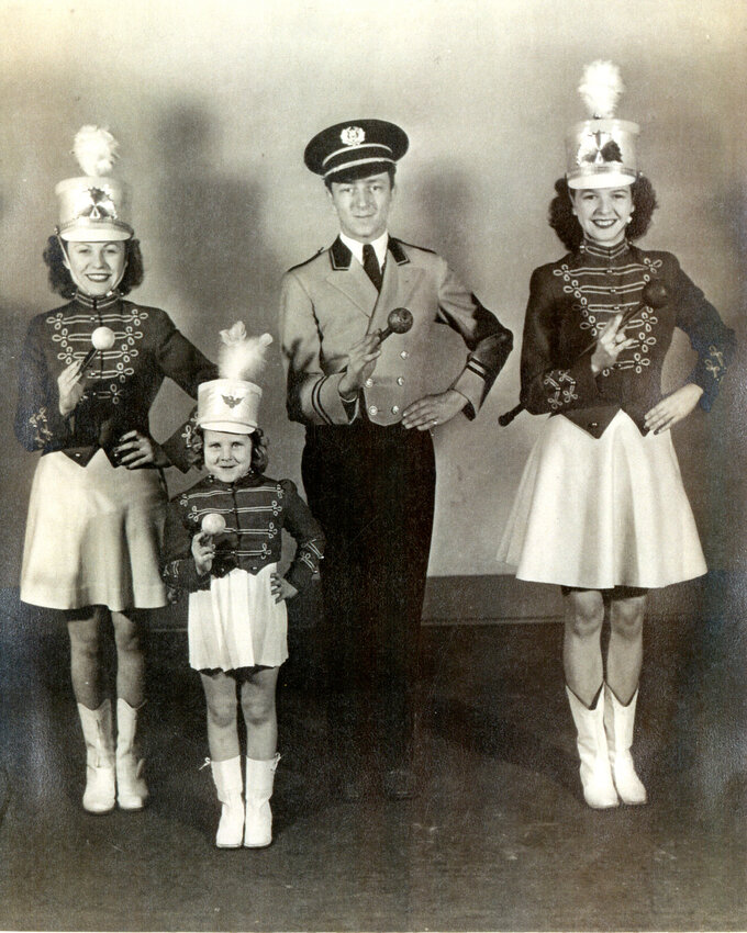 Carol Collard, second from left, is pictured with fellow Lumberjack Band majorettes, Germaine Pirlot, left, and Gloria Birmingham, right,  in 1944.