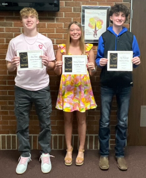 The Tri-County students with their certificates. Gage Beggs, Soph (Honorable Mention), Courtney Hildebrandt Senior (Honorable Mention) and RJ Meddaugh, Soph (2nd Team).