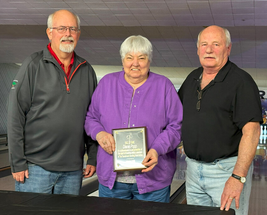 Pictured, from left, are inductees Steve Kahle, Diane Popp and Rick Grube.