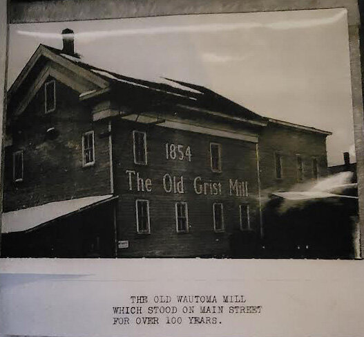 The old Wautoma Mill, which stood where BMO Harris Bank sits today.