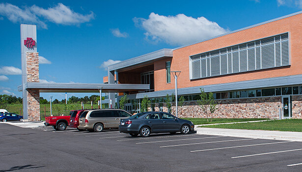 The Marshfield Clinic and Sanford Health are cutting almost 100 positions, saying the cuts are part of the “integration process” after the two health systems merged.