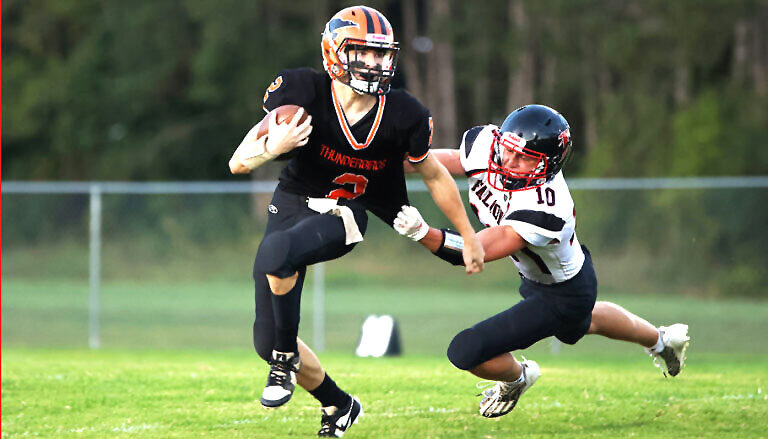 Abbotsford's Evan Reis of Abbotsford can't keep Iola-Scandinavia quarterback Jensen Rice from picking up a first down during the regular season. Central Wisconsin Conference-Small coaches named Rice as the CWC-Small player of the year on offense. I-S coach Scott Erickson was also named the league's coach of the year after leading the Thunderbirds to a CWC-Small championship and a spot in the WIAA playoffs.
Holly Neumann Photo