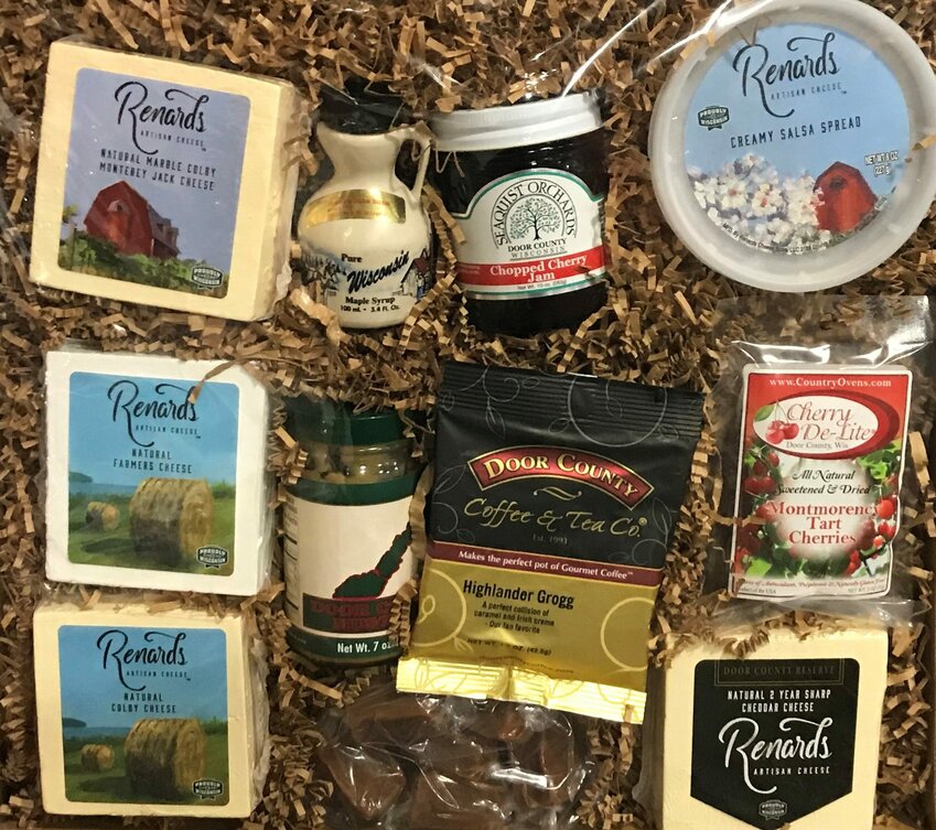 Four cheeses made in-house and other food items made on the Peninsula are featured in the the Door County Special gift box from Renard's Cheese in Sturgeon Bay. Renard's closed its Algoma retail store Oct. 5 because of staffing problems but its employees will continue working at the Sturgeon Bay location.